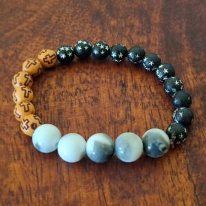 Multi-Pattern Beaded Bracelet with Cross and Star Designs