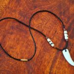Tribal Style Beaded Necklace with Faux Tooth Pendant