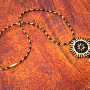 Black and Gold Beaded Necklace with Circular Pendant