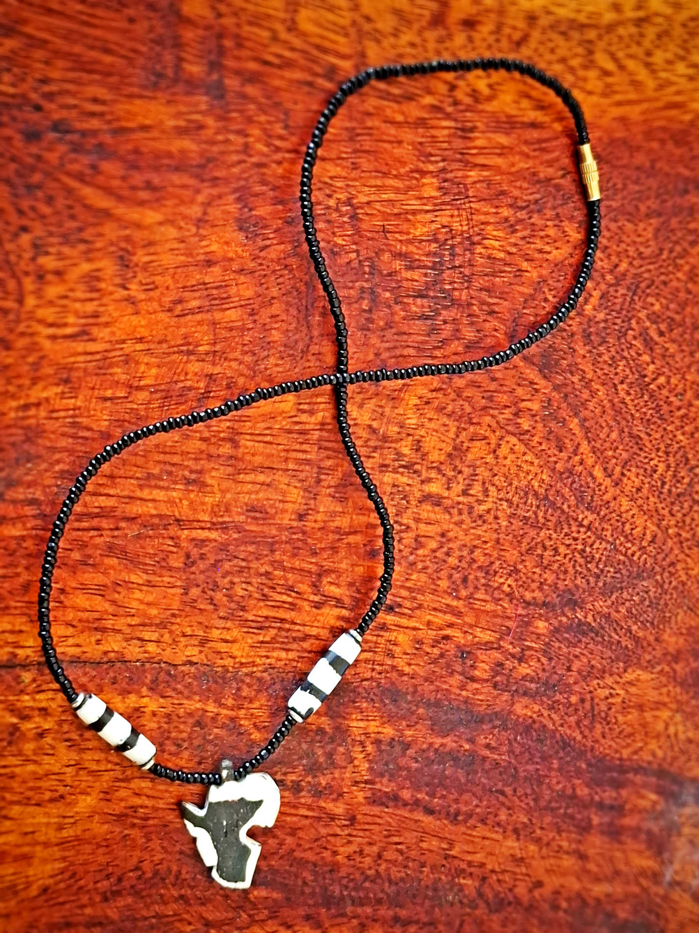 Africa Map Pendant Necklace – Black Beaded Tribal Style